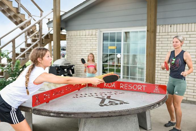 Round four way ping pong table Kids playing on concrete round four way table tennis table