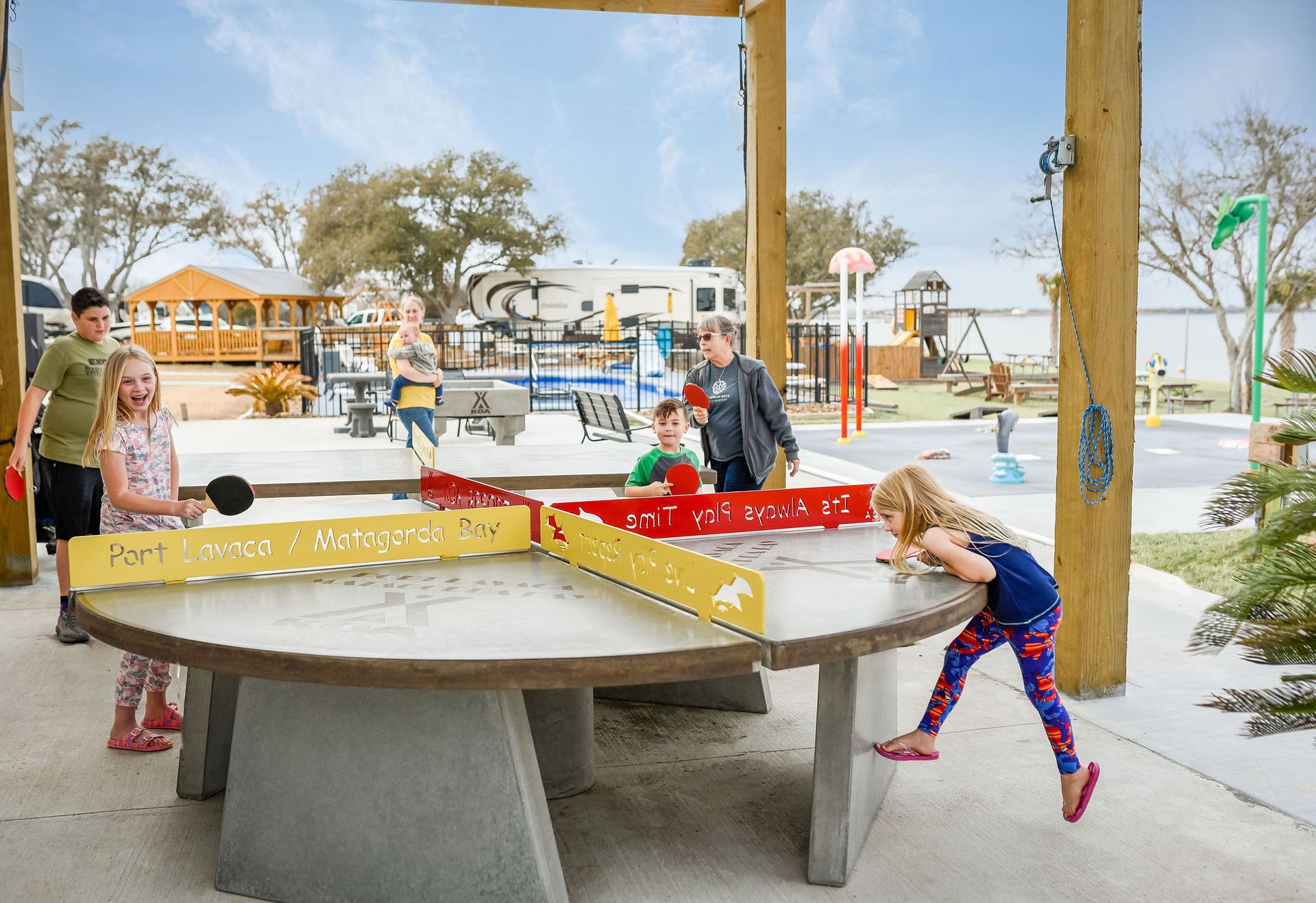 Round Four Way concrete ping pong tables at Port Lavaca KOA