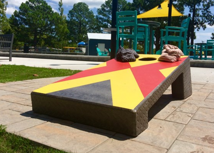 Concrete Cornhole board in the park