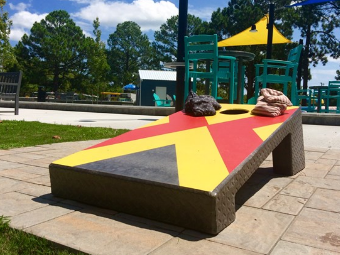 Concrete Cornhole Board in a park