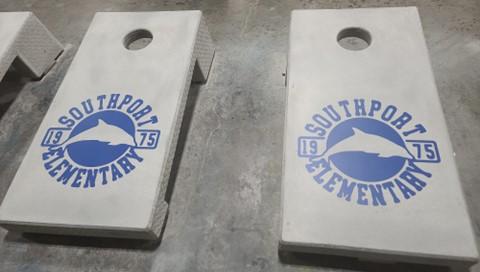 Southport Elementary Concrete cornhole boards Concrete cornhole boards with the Southport Elementary school logo