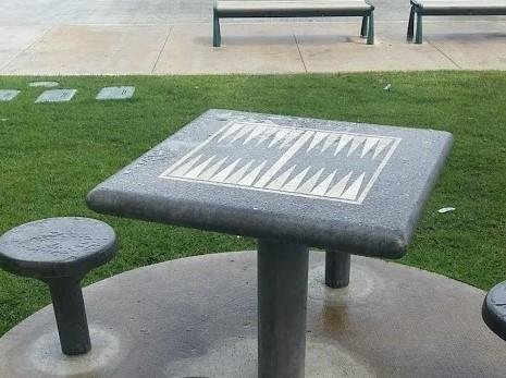 Direct Burial Chinese Checkers Table Installation Permanent concrete Chinese Checkers table with direct burial post installation for parks and plazas.