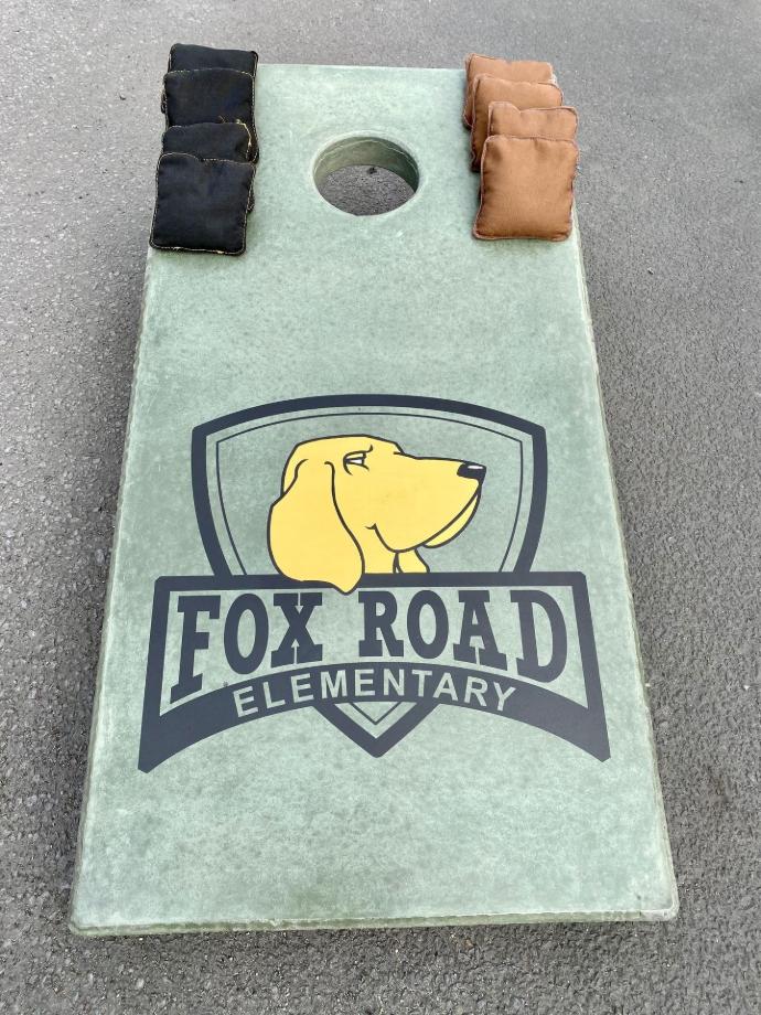 Concrete Cornhole Board with school branding for Fox Road Elementary School