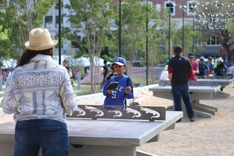 Ping Pong players at the concrete ping pong tables in El Paso's San Jacinto Plaza