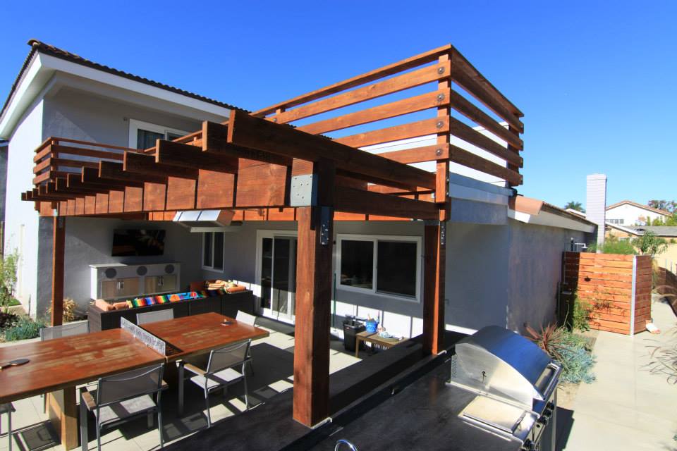 Peace love and ping pong dining table and concrete ping pong in landscaped yard
