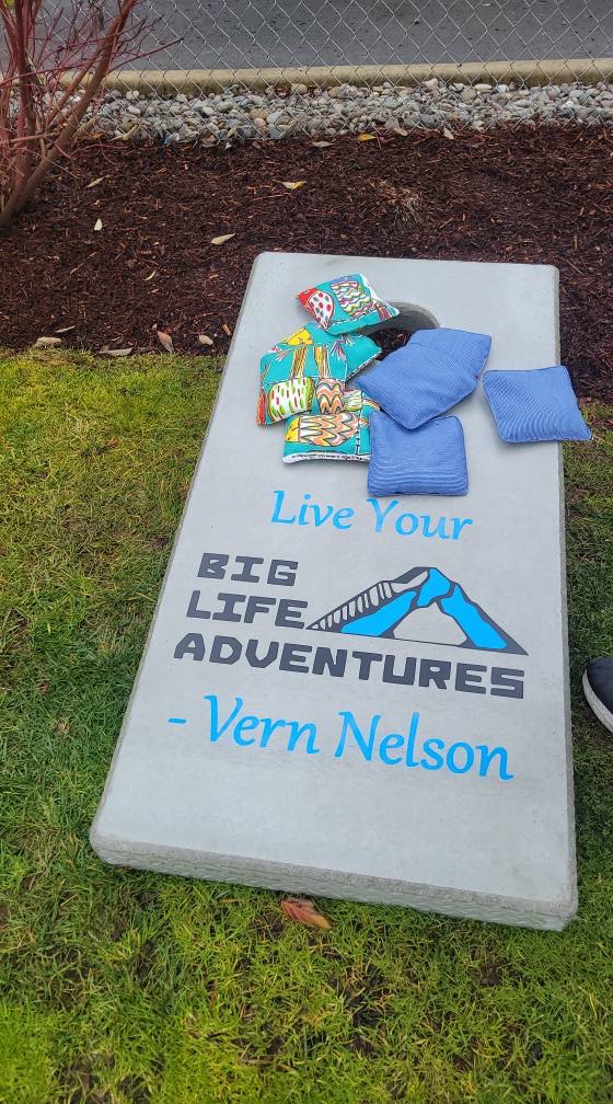 Concrete cornhole boards at a nice house