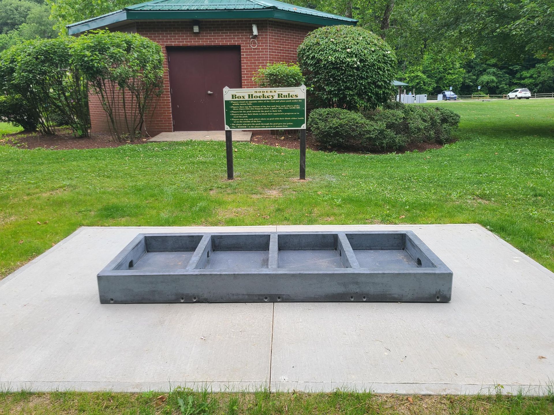 Stone Age concrete game installation at O'Hara Pennsylvania public outdoor space